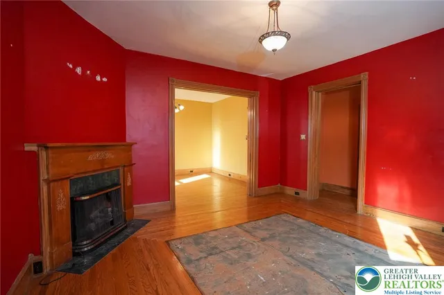 a kitchen with a stove a sink and a refrigerator