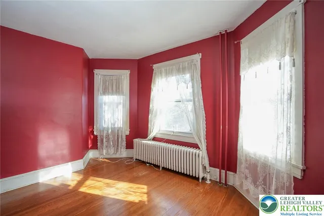 a bathroom with a bathtub and a sink