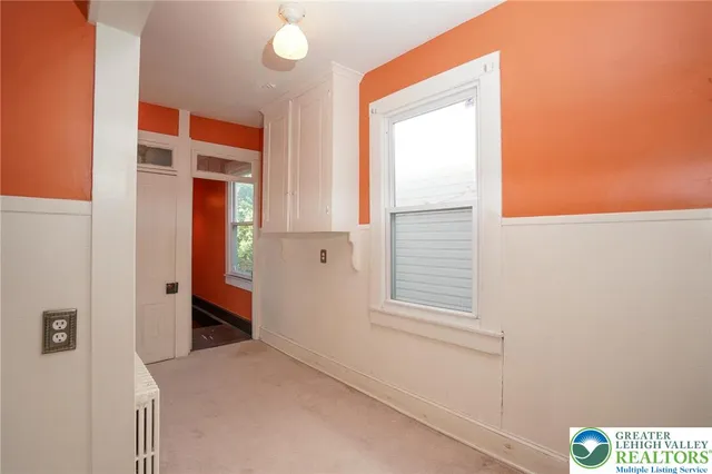 a view of a livingroom with wooden floor