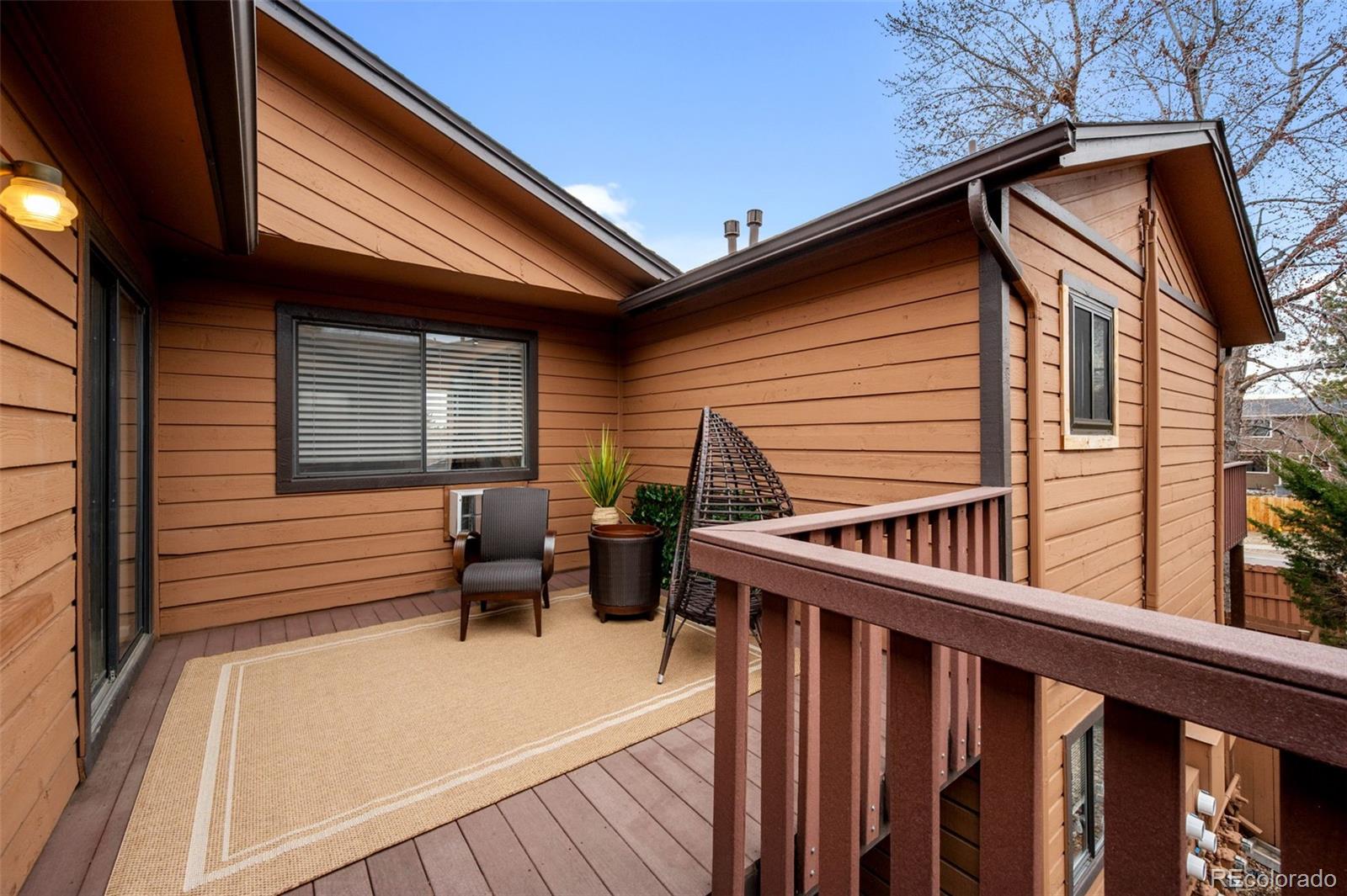 9409 West 89th Circle Broomfield, CO 80021 - Photo 11 of 22 a view of a two chairs in the balcony