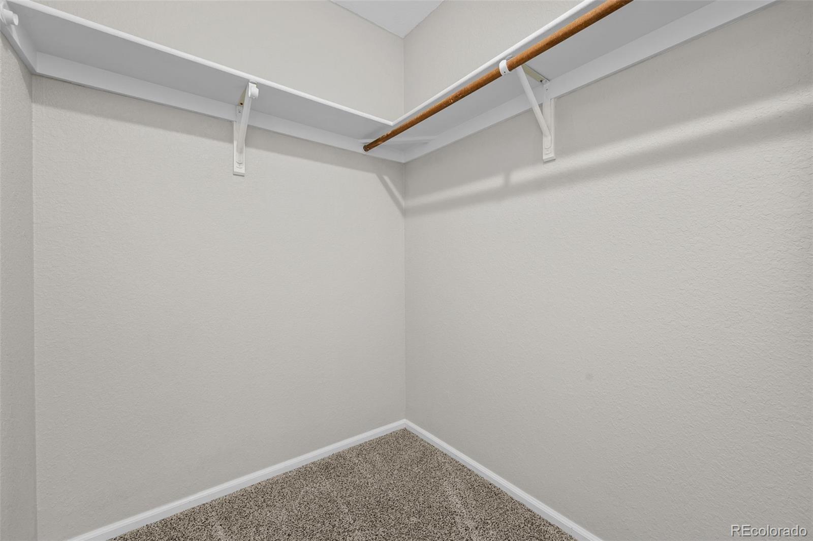 9409 West 89th Circle Broomfield, CO 80021 - Photo 15 of 22 a view of an empty walk in closet