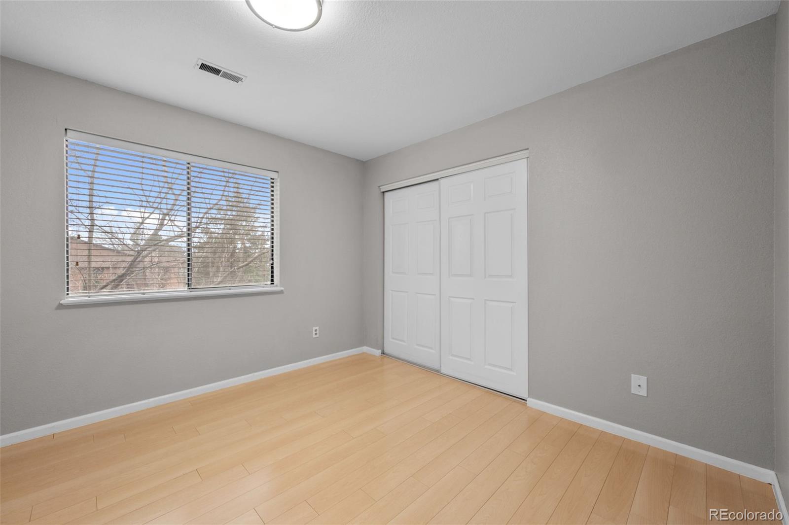 9409 West 89th Circle Broomfield, CO 80021 - Photo 16 of 22 a view of an empty room with a window