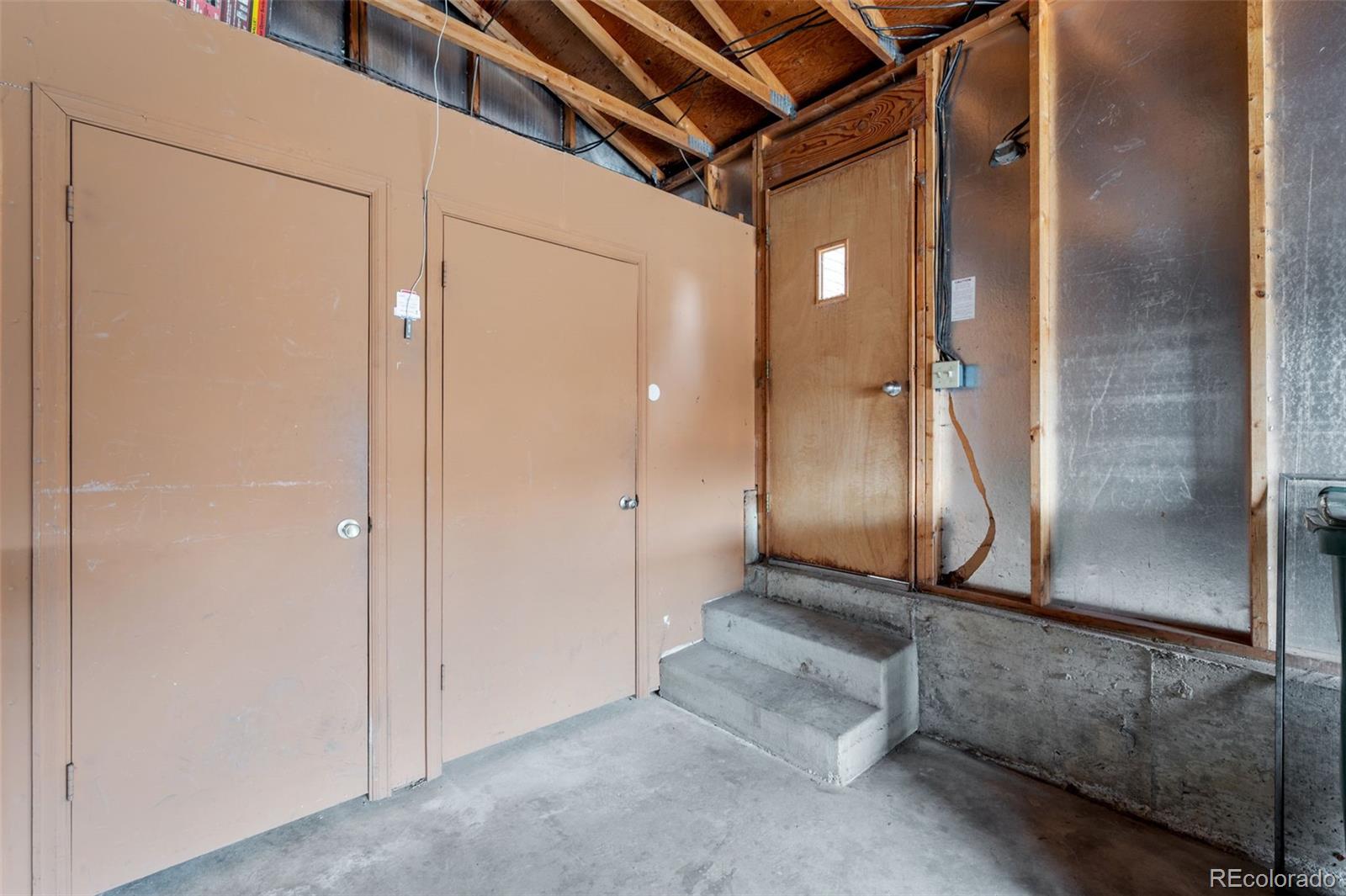 9409 West 89th Circle Broomfield, CO 80021 - Photo 19 of 22 a view of a room with wooden floor