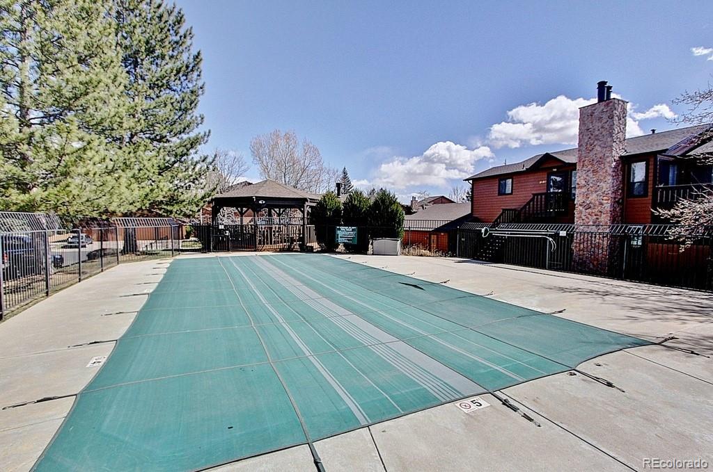 9409 West 89th Circle Broomfield, CO 80021 - Photo 22 of 22 a view of a house with a yard