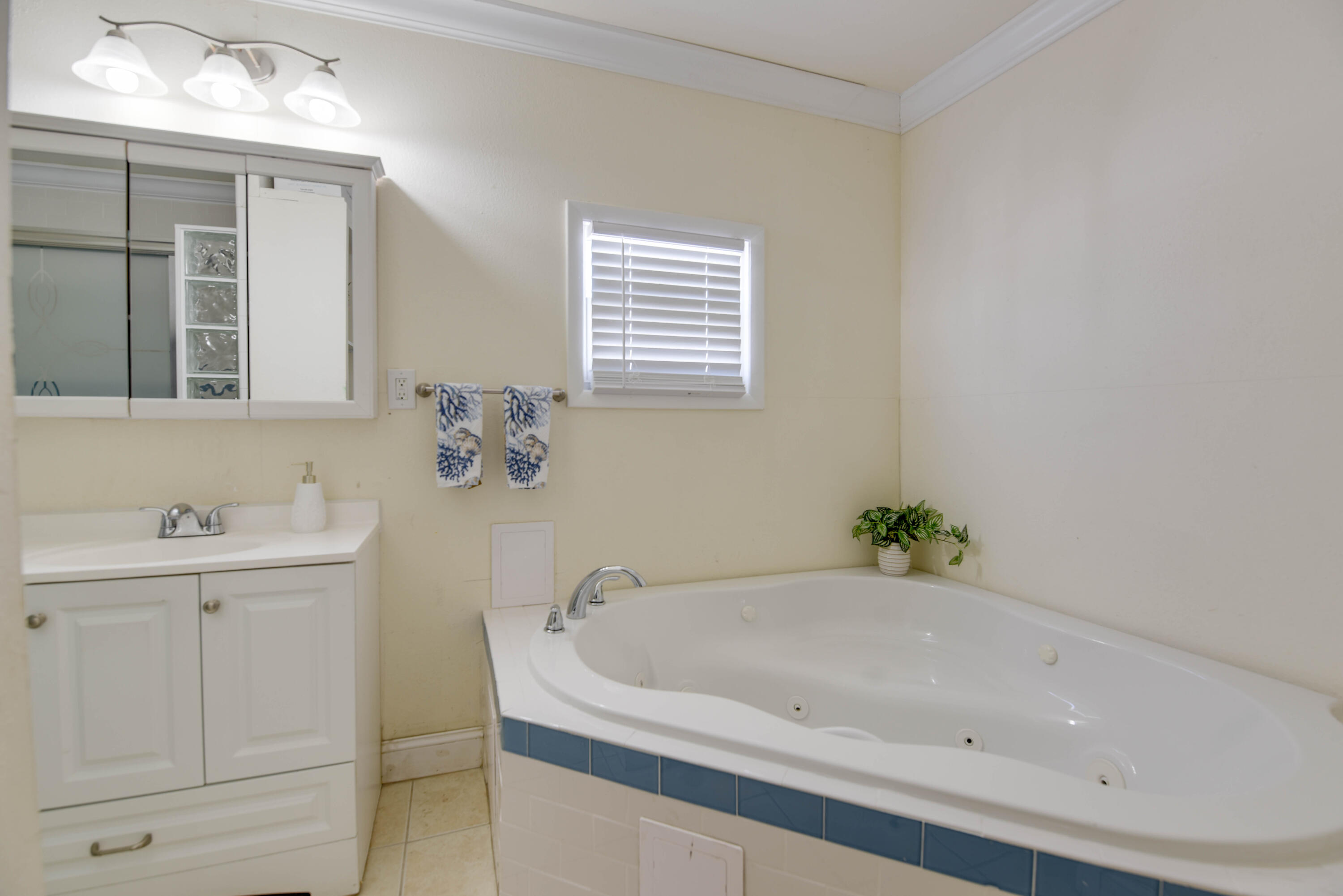 1524 5th Street Key West, FL 33040 - Photo 15 of 31 a bathroom with a bathtub and a sink