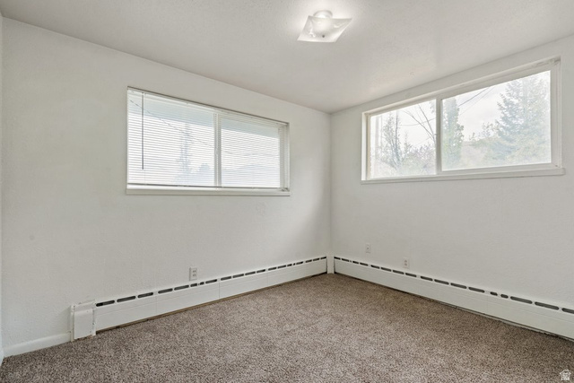 149 West 1600th Street South Mapleton, UT 84664 - Photo 20 of 44 Carpeted empty room with a baseboard radiator