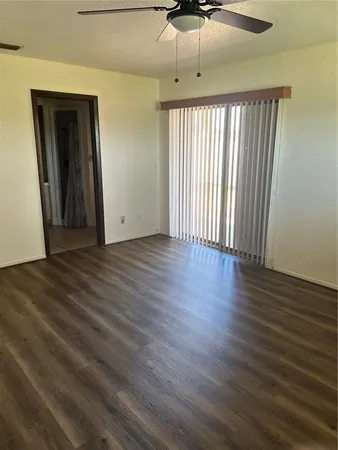 a view of a livingroom with wooden floor