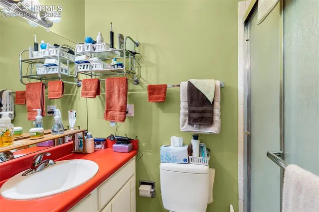 a view of a livingroom with walk in closet and toys