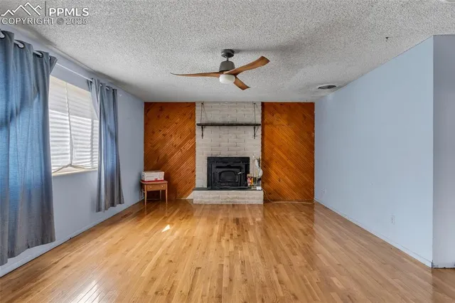 a view of livingroom with hardwood and furniture