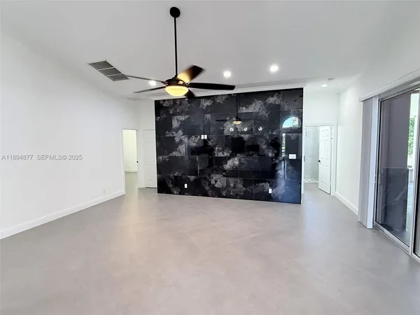 a view of a kitchen with a refrigerator a sink and a dishwasher