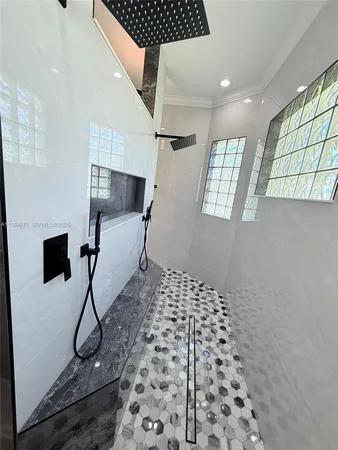 a view of empty room with windows