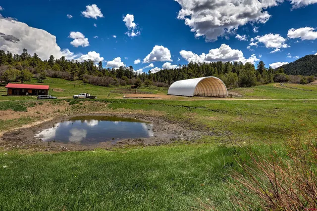 a view of a building with a yard