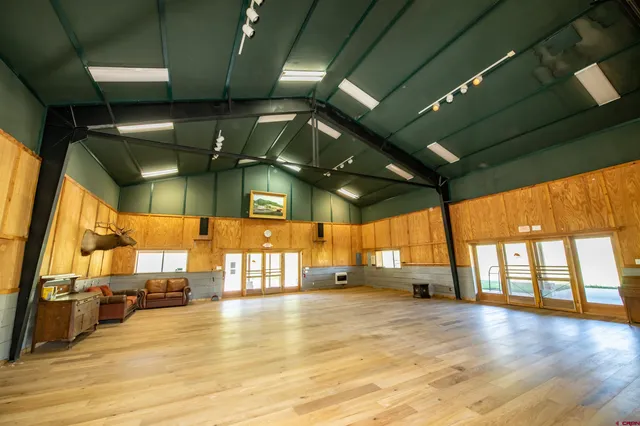 a kitchen with stove and a table