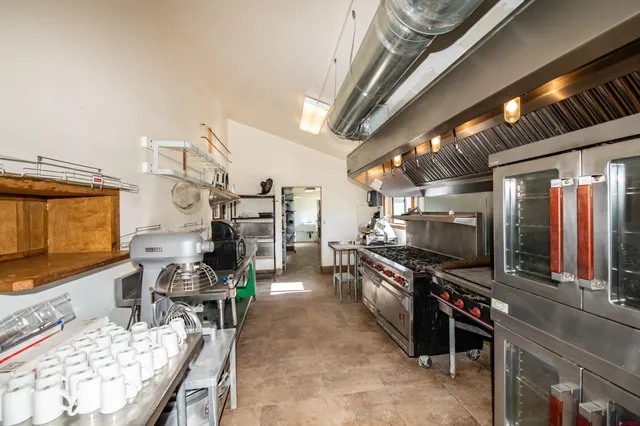 a room with lots of clutter and equipment