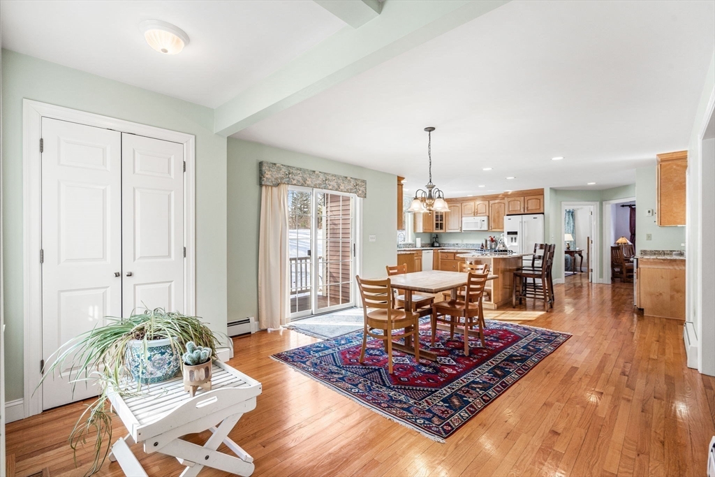 37 Fellows Road Ipswich, MA 01938 - Photo 11 of 42 a living room with furniture a dining table and a dining table with wooden floor