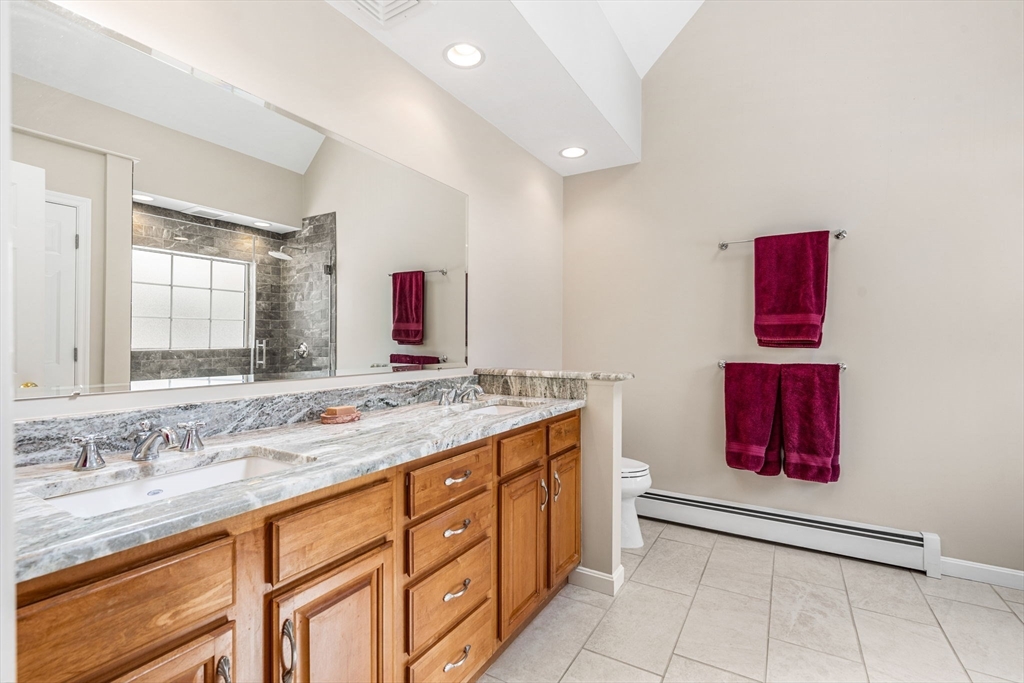 37 Fellows Road Ipswich, MA 01938 - Photo 28 of 42 a bathroom with a sink and a mirror