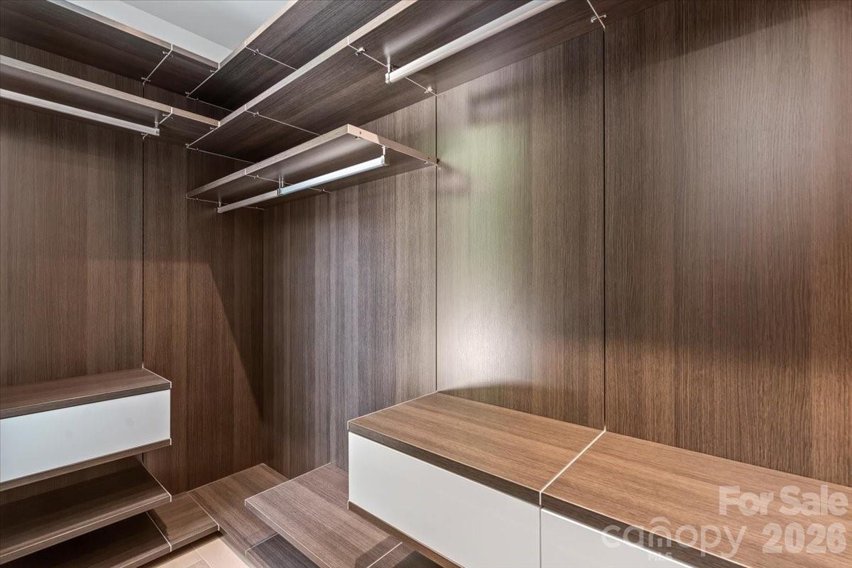 1620 South Tryon Street Charlotte, NC 28203 - Photo 19 of 29 a room with a bed and a window