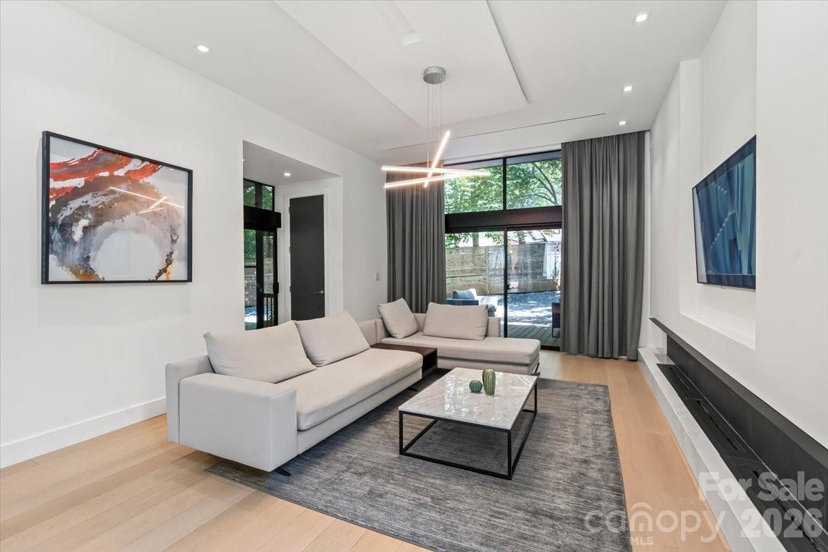 1620 South Tryon Street Charlotte, NC 28203 - Photo 6 of 29 a living room with furniture and a large window