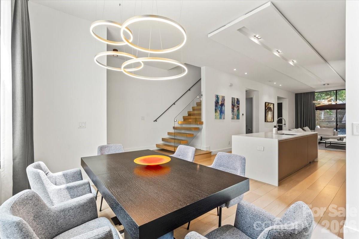 1620 South Tryon Street Charlotte, NC 28203 - Photo 8 of 29 a living room with furniture and wooden floor