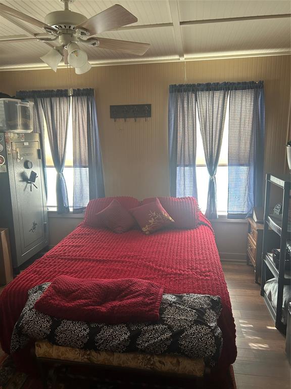 244 County Road 1973 Yantis, TX 75497 - Photo 11 of 16 a bedroom with a bed and window