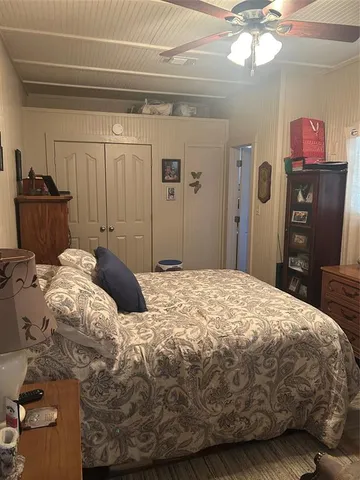 a bathroom with a double vanity sink mirror and tub