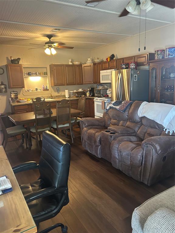 244 County Road 1973 Yantis, TX 75497 - Photo 7 of 16 a living room with lots of furniture and lamp