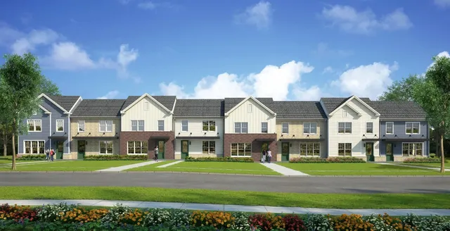 a view of a big house with a big yard and large trees