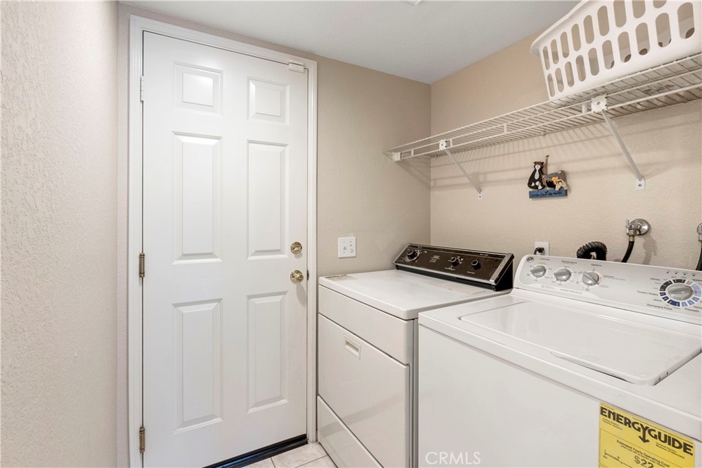 6879 Mission Grove Parkway North Riverside, CA 92506 - Photo 13 of 53 a utility room with dryer and washer