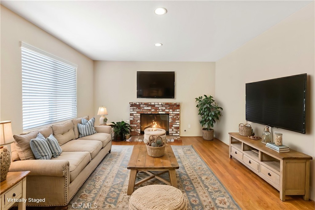 6879 Mission Grove Parkway North Riverside, CA 92506 - Photo 14 of 53 a living room with furniture and a flat screen tv