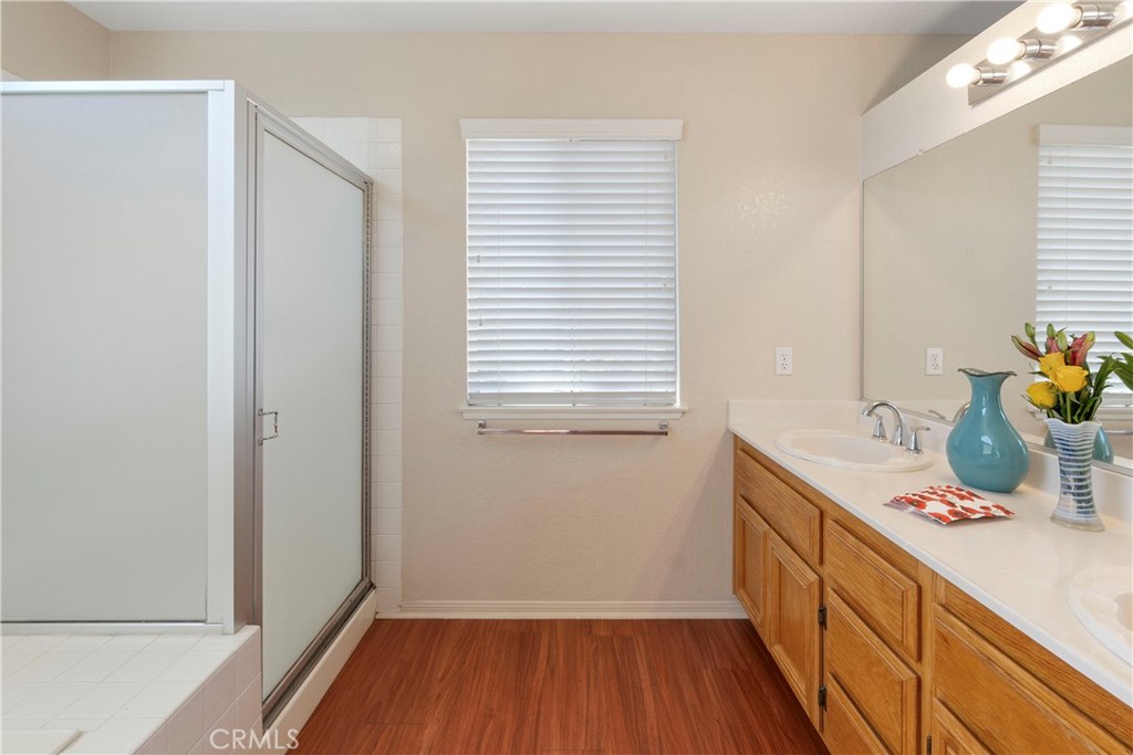 6879 Mission Grove Parkway North Riverside, CA 92506 - Photo 28 of 53 a kitchen with a sink and wooden floor