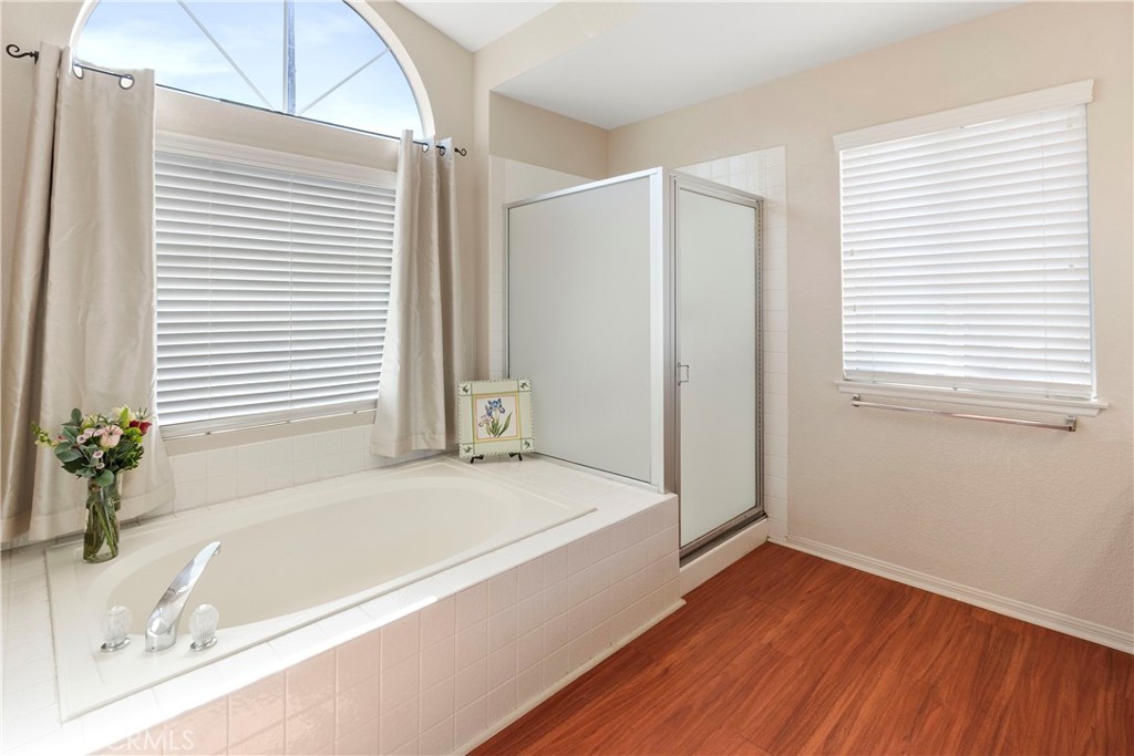 6879 Mission Grove Parkway North Riverside, CA 92506 - Photo 29 of 53 a bathroom with a bathtub and a sink
