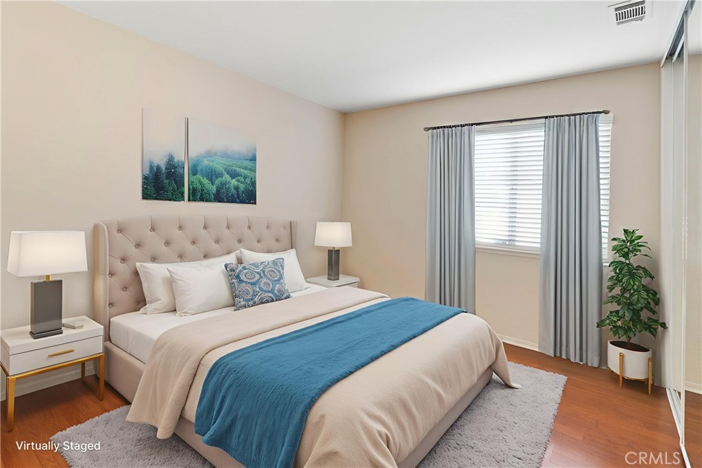 6879 Mission Grove Parkway North Riverside, CA 92506 - Photo 10 of 53 a bedroom with bed and a window