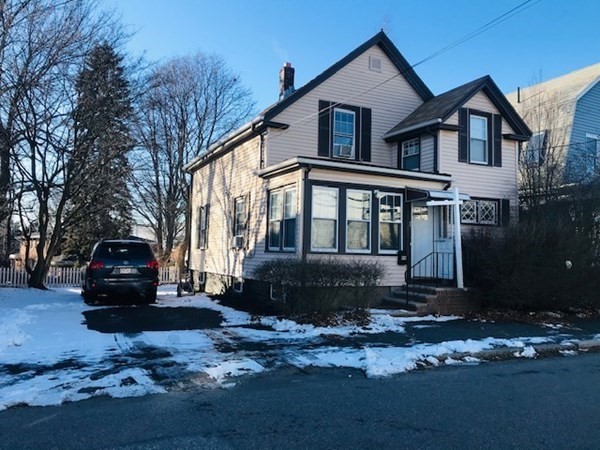 90 Pine Street Swampscott, MA 01907 - Photo 1 of 22 a front view of a house with a yard