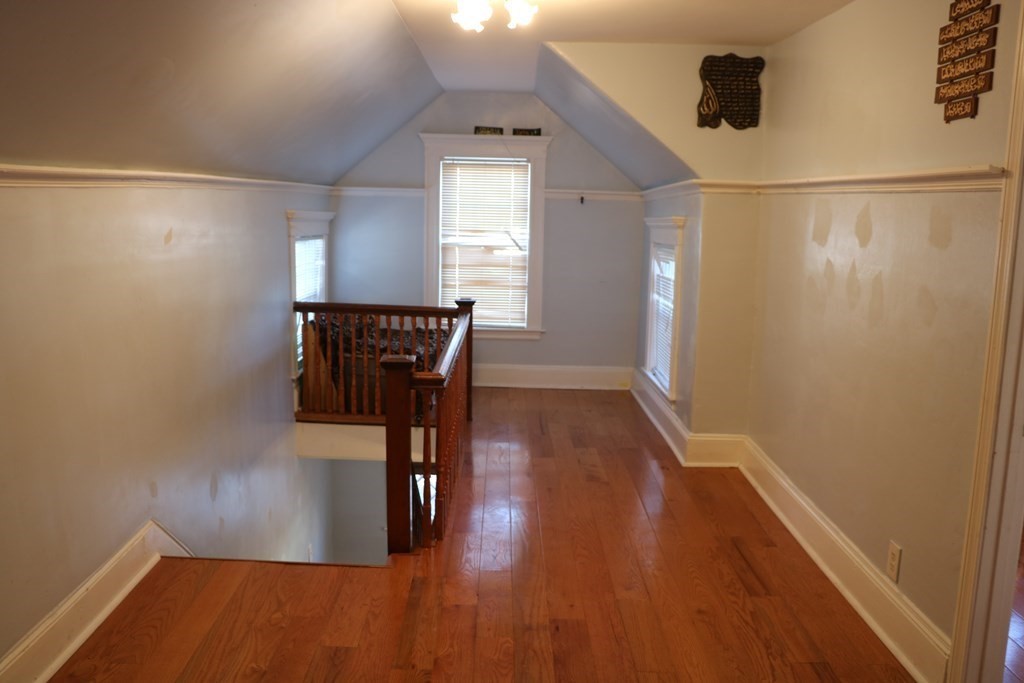 90 Pine Street Swampscott, MA 01907 - Photo 14 of 22 a view of a hallway with wooden floor