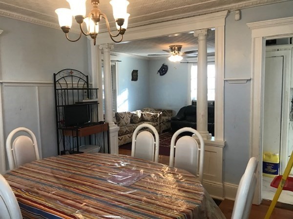 90 Pine Street Swampscott, MA 01907 - Photo 8 of 22 a bedroom with a bed and a mirror on dresser