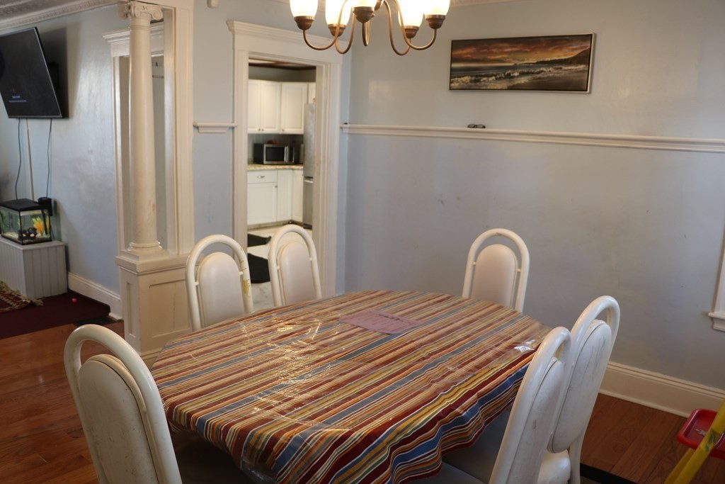 90 Pine Street Swampscott, MA 01907 - Photo 9 of 22 a bedroom with furniture and flat screen tv