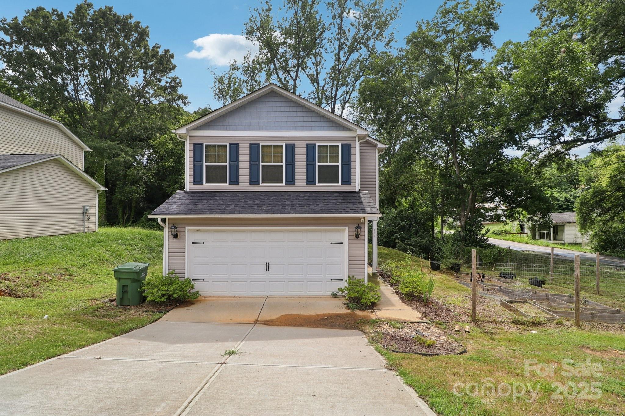 100 South Gregory Street Lancaster, SC 29720 - Photo 1 of 27 a front view of a house with a yard