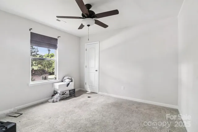 a room with furniture and windows