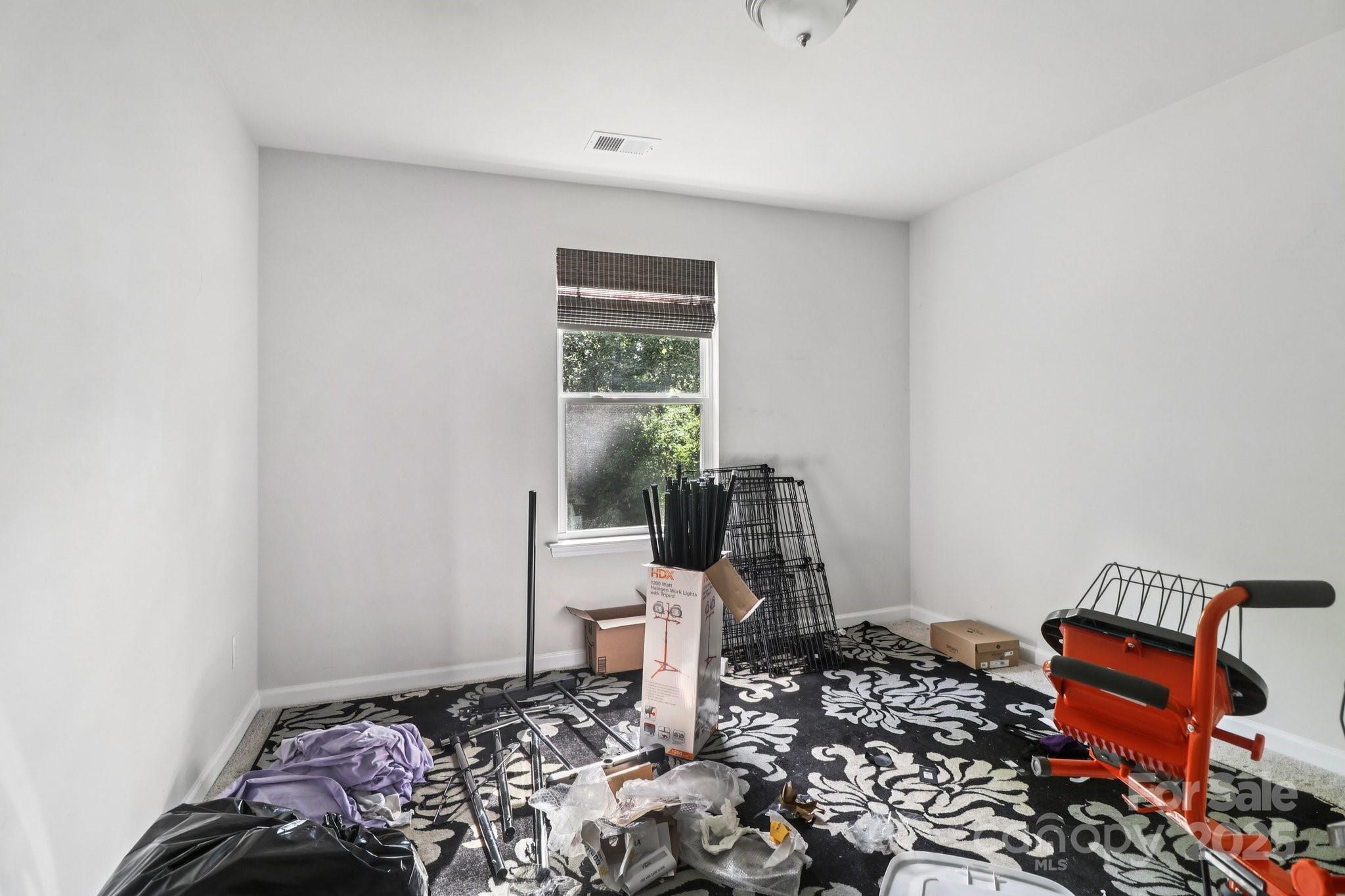 100 South Gregory Street Lancaster, SC 29720 - Photo 15 of 27 a room with furniture and a window