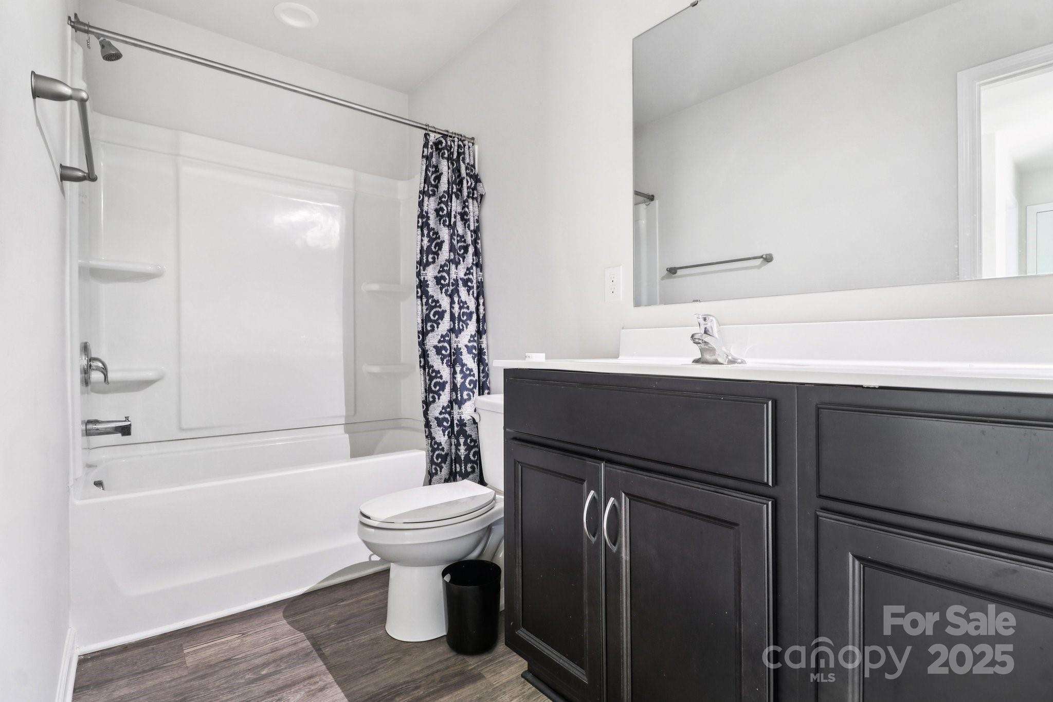 100 South Gregory Street Lancaster, SC 29720 - Photo 19 of 27 a bathroom with a sink toilet and shower