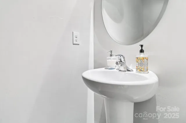 a sink with a mirror