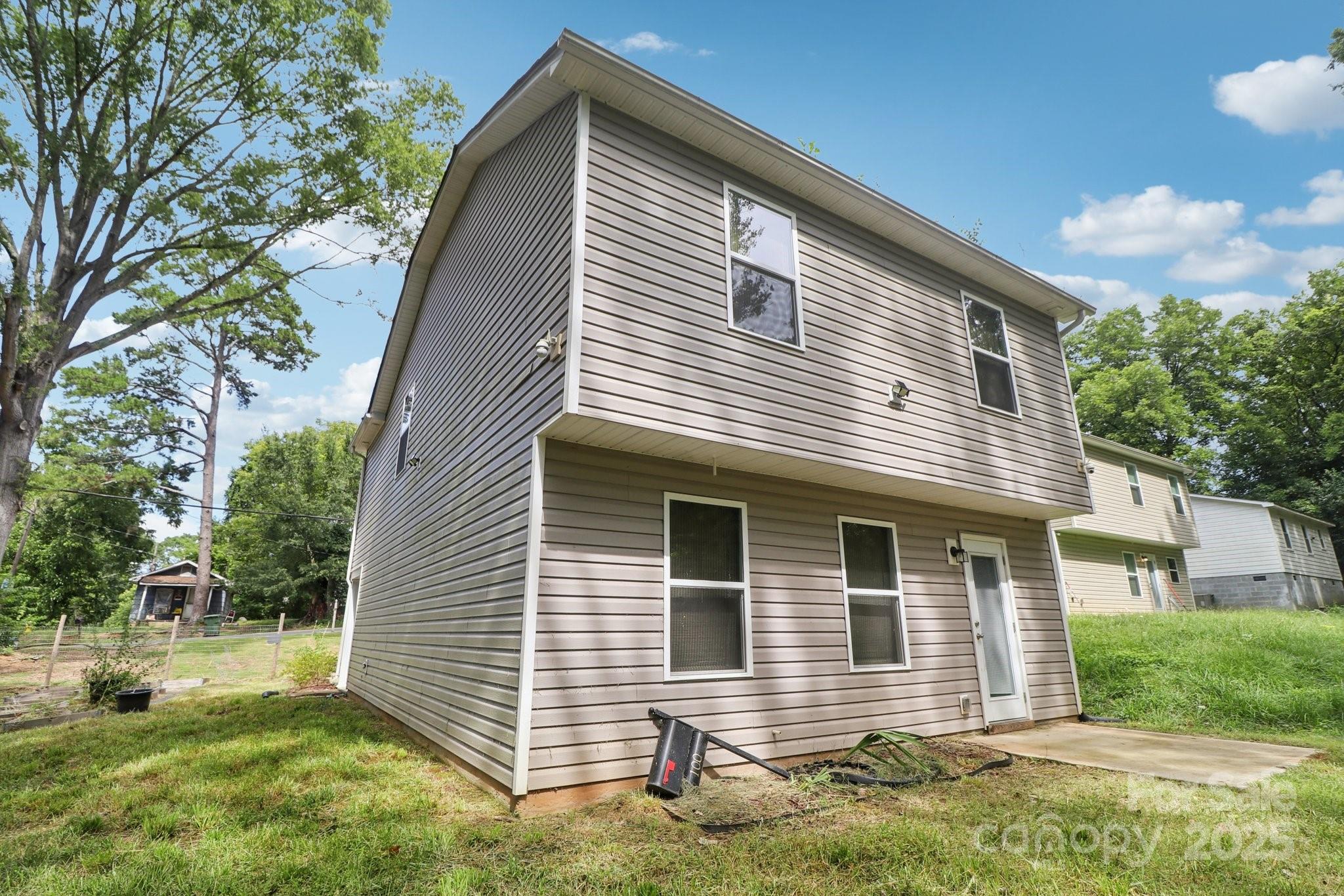 100 South Gregory Street Lancaster, SC 29720 - Photo 23 of 27 a front view of a house with a yard