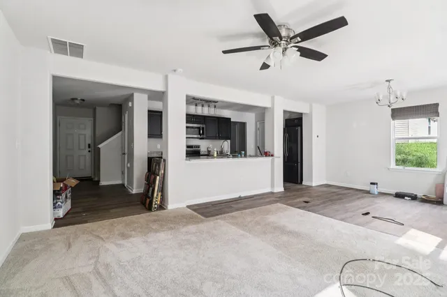 a view of a livingroom with a flat screen tv