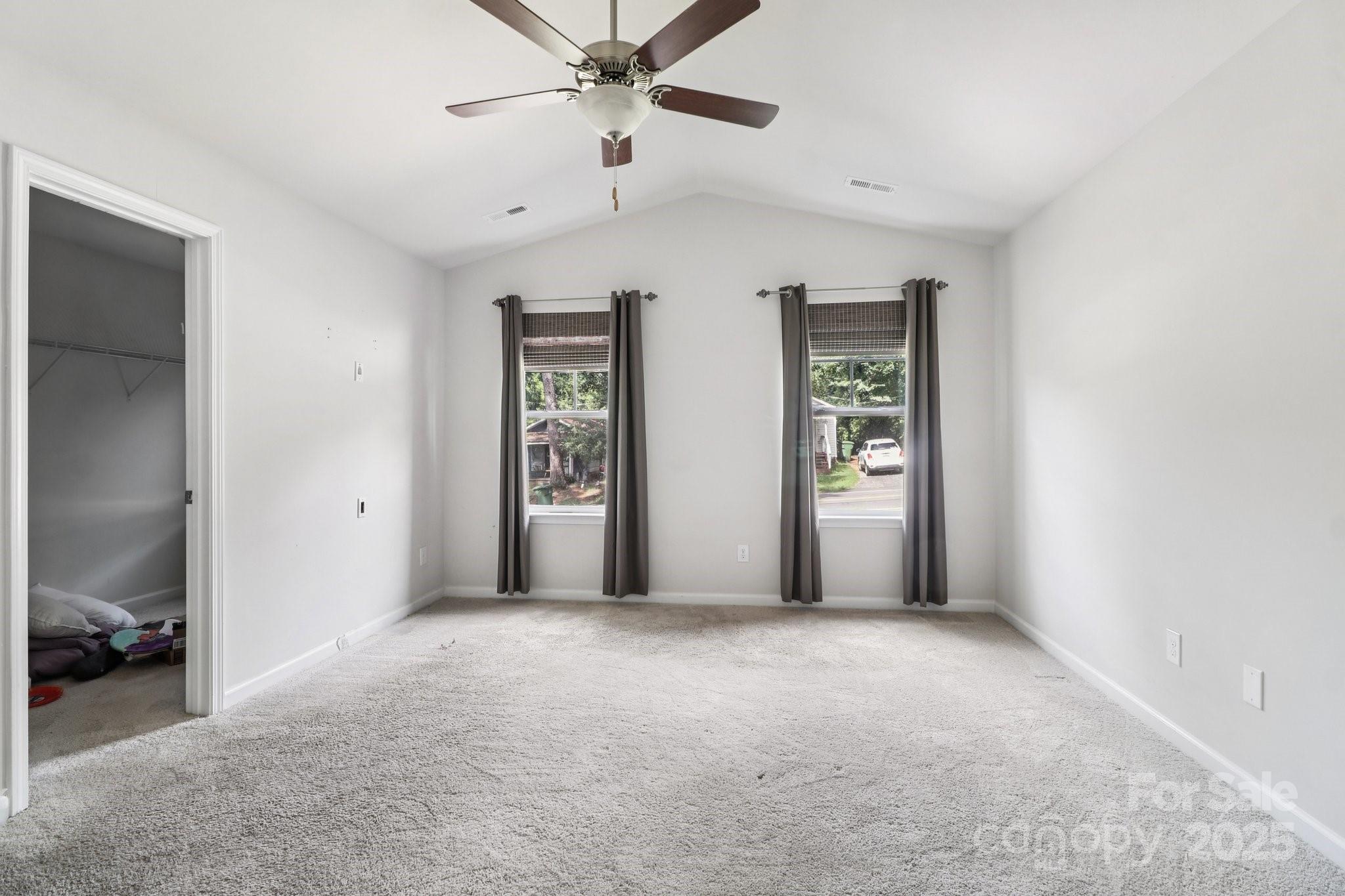 100 South Gregory Street Lancaster, SC 29720 - Photo 7 of 27 a view of a livingroom with a ceiling fan and window