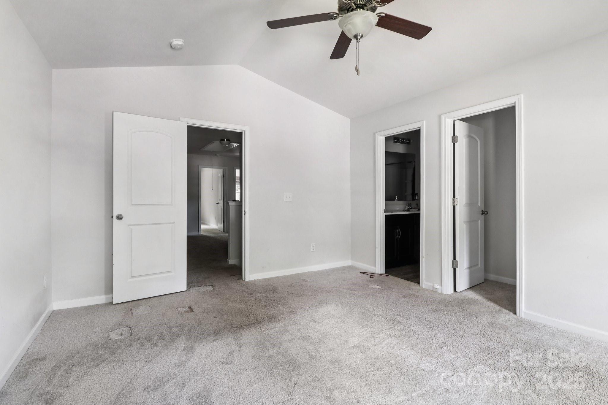 100 South Gregory Street Lancaster, SC 29720 - Photo 8 of 27 an empty room with closet and windows