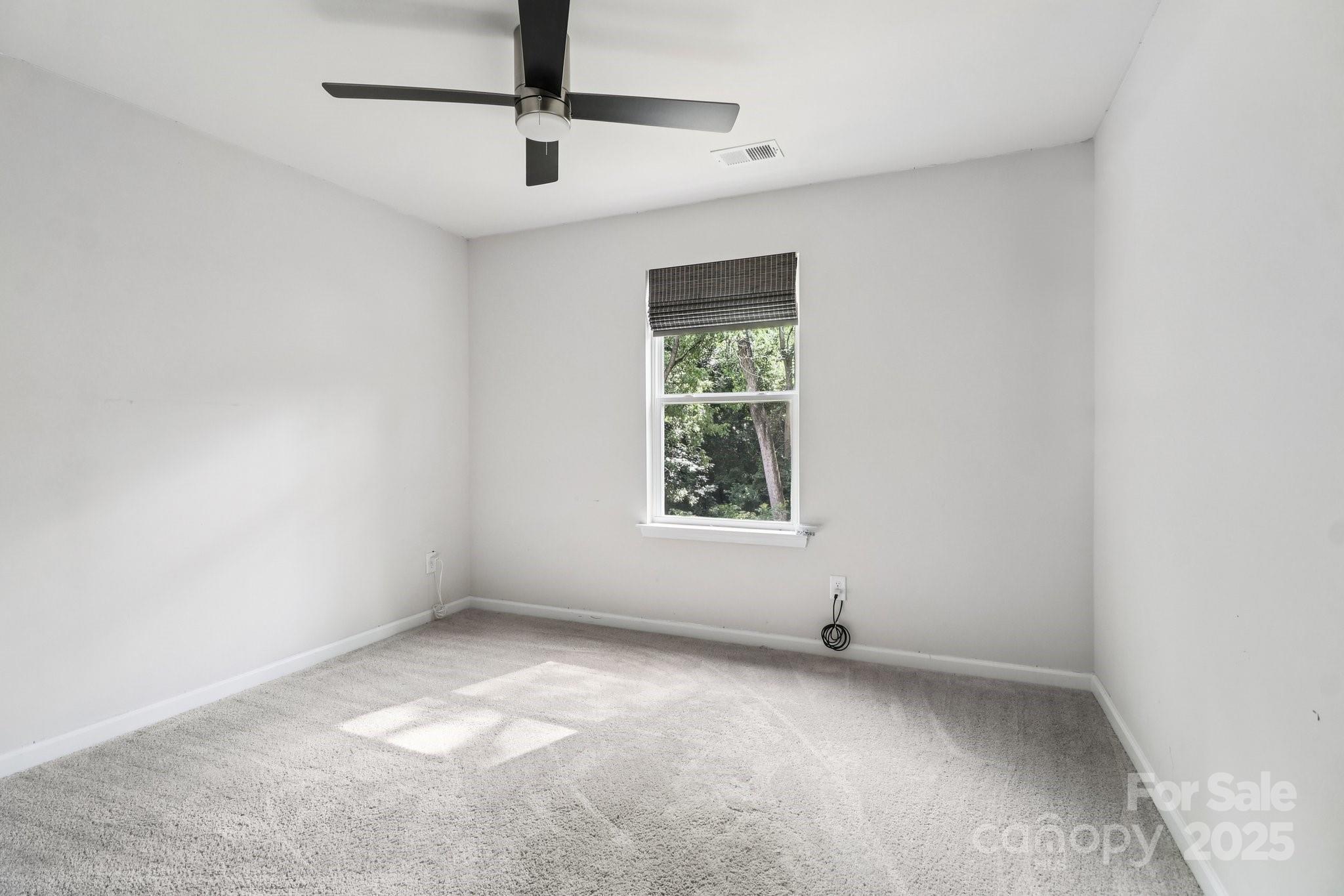 100 South Gregory Street Lancaster, SC 29720 - Photo 10 of 27 a view of an empty room with a window