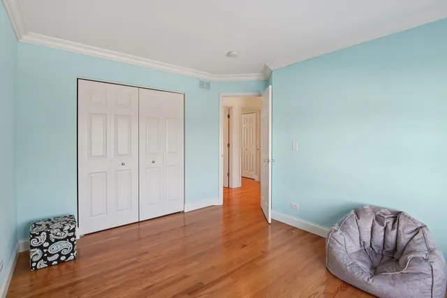a view of livingroom with hardwood floor and a ceiling fan