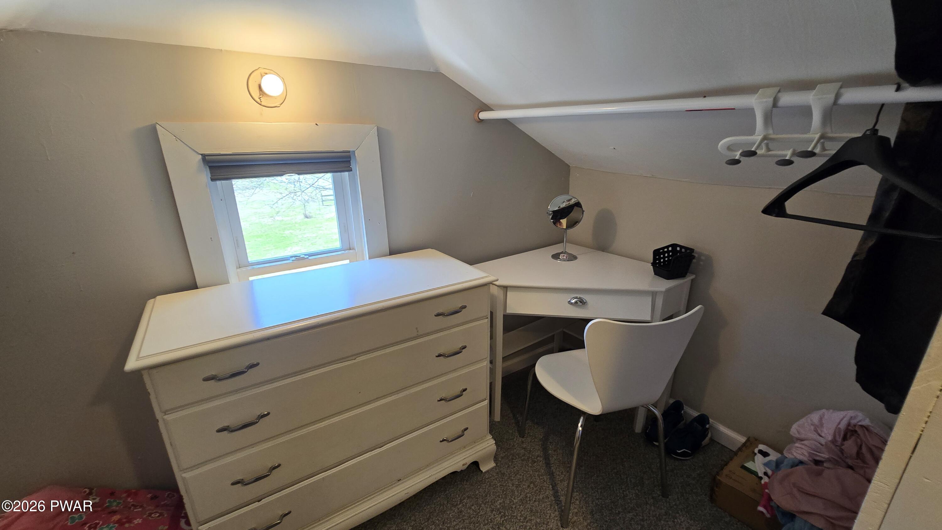 430 Griffith Road Tyler Hill, PA 18469 - Photo 20 of 31 a room with a chair and a desk
