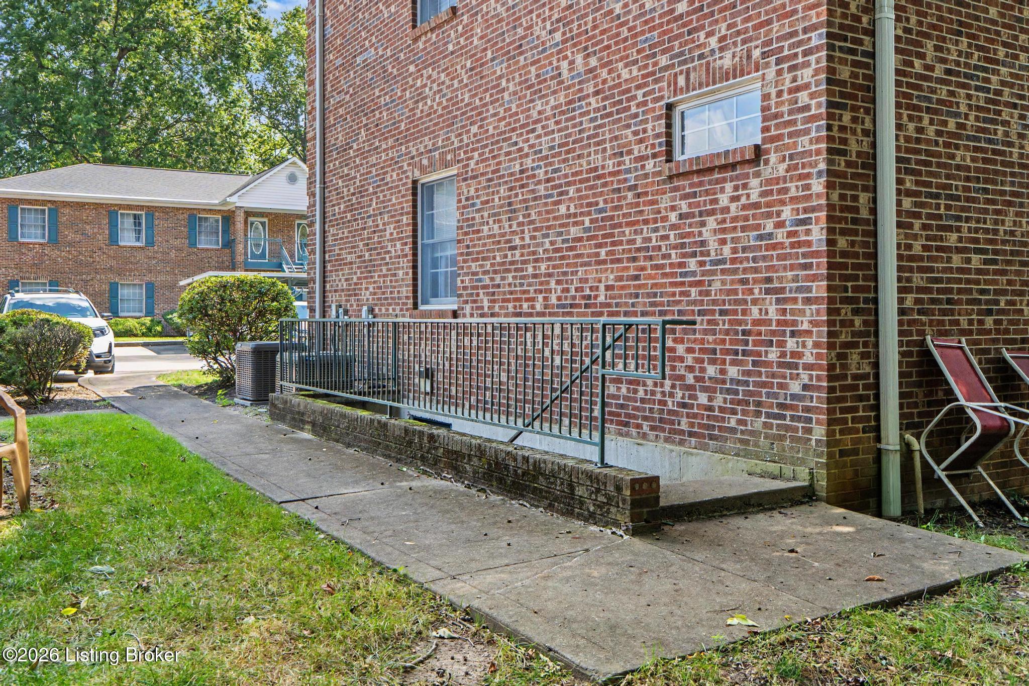 3112 Hendon Road Louisville, KY 40220 - Photo 21 of 26 A valuable bonus is just downstairs. Exterior stairs along the side of the building lead to the basement storage area.