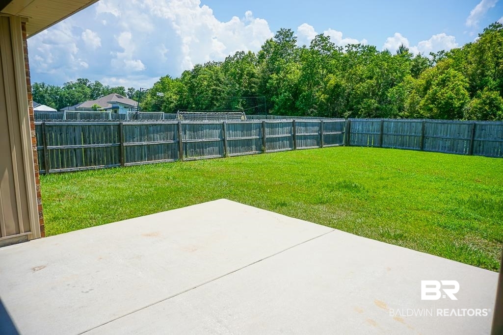 593 Begeman Road Mobile, AL 36608 - Photo 20 of 23 View of yard with a patio